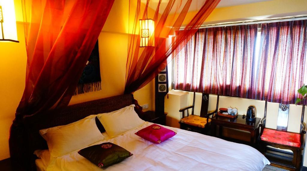 Lijiang Wangjia Courtyard Inn Rom bilde