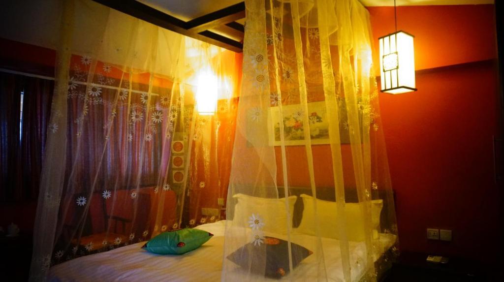 Lijiang Wangjia Courtyard Inn Rom bilde