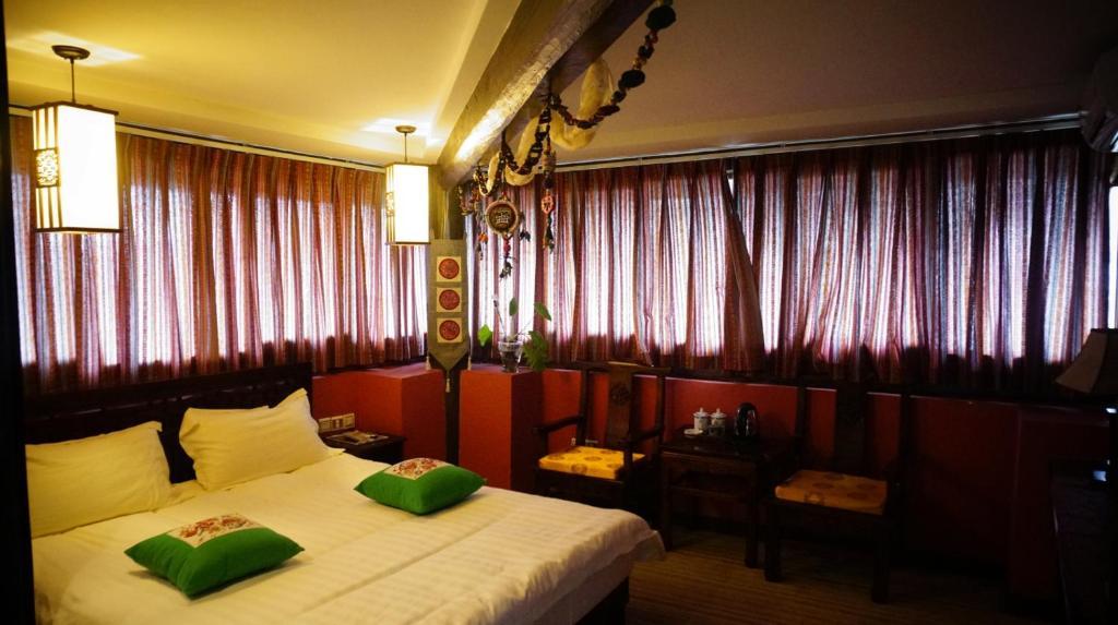 Lijiang Wangjia Courtyard Inn Rom bilde